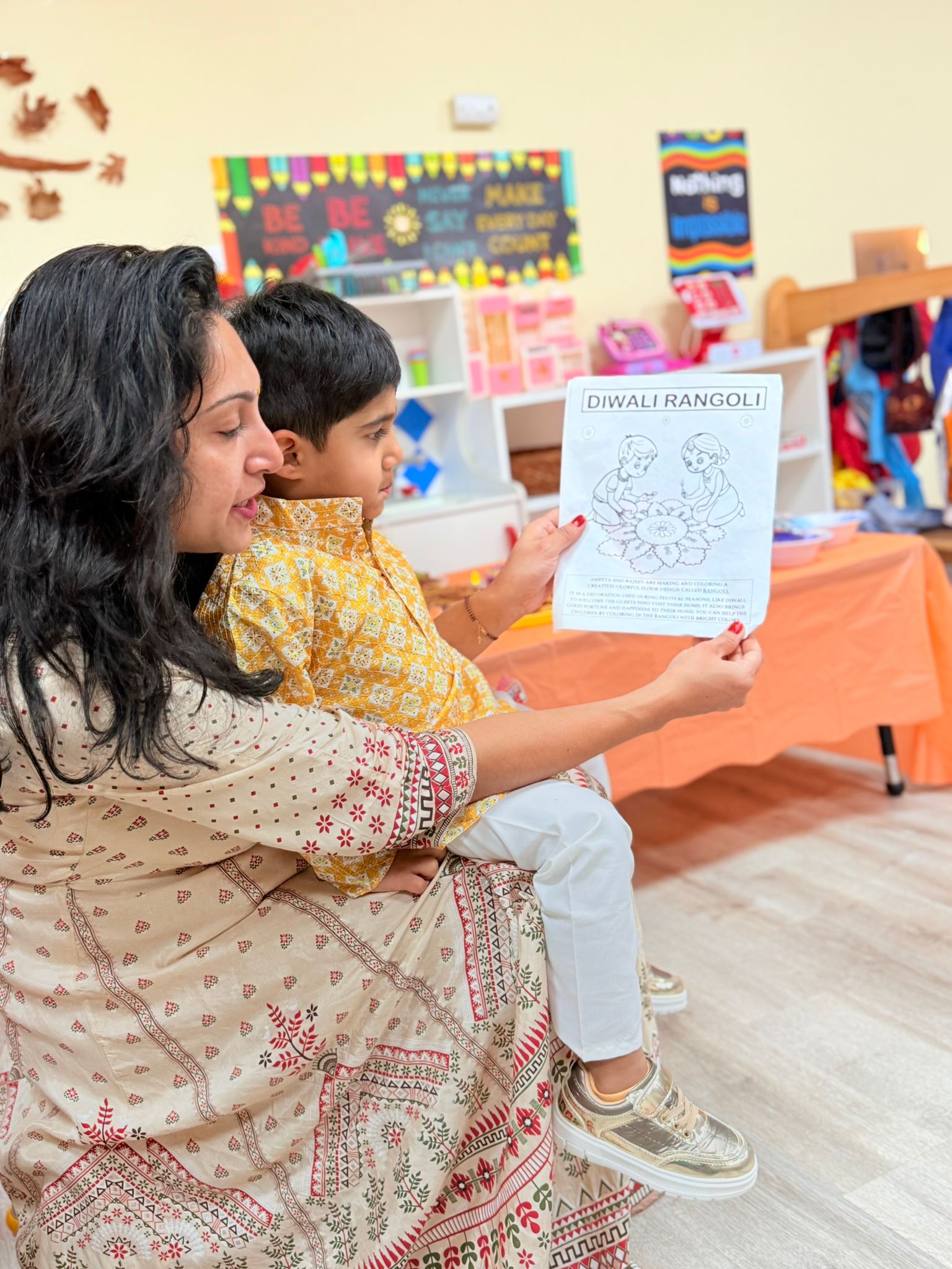 A family teaching children how rangoli connects art, tradition, and celebration